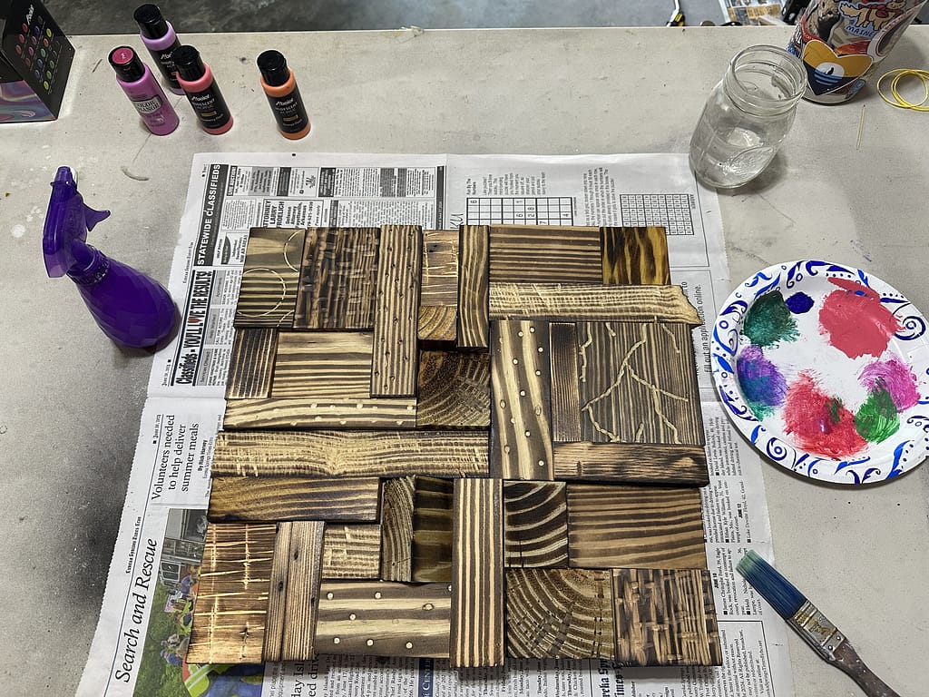 Art materials and wood frame set up and ready for painting, beginning the transformation into Starlit Showgirl.