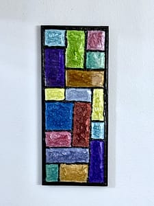 Close-up of Radiant Mosaic Glow vertical wood mosaic with textured blocks in bright jewel tones