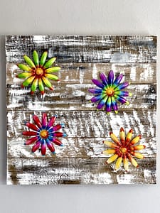 Close-up of Spring Pallet Bloom Garden pallet wood wall art with four colorful raised flowers