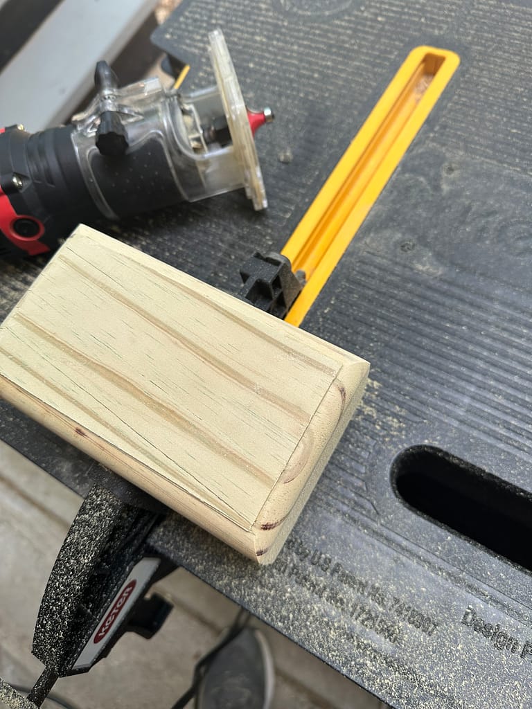 Block of pine wood with sanded, smooth edges on workbench